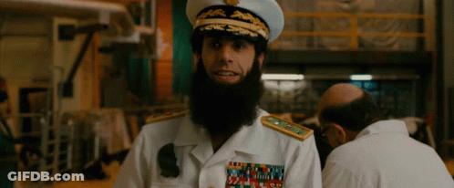 Bearded Man In Navy Uniform With US Navy Badge GIF