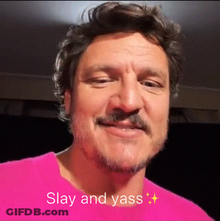 A Man With A Beard Is Wearing A Pink Shirt With The Words Slay And Yass GIF
