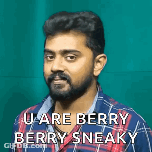 A Man With A Beard Is Wearing A Plaid Shirt And Says " U Are Berry Berry Sneaky " GIF