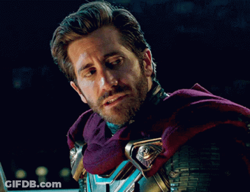 A Man With A Beard Is Wearing A Purple Cape And Armor GIF