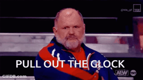 A Man With A Beard Is Wearing A Red And Blue Jacket And Says Pull Out The Clock GIF