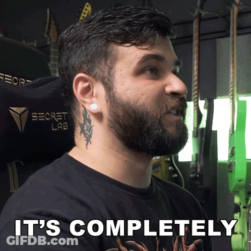 A Man With A Beard Is Wearing A Secret Lab Chair GIF