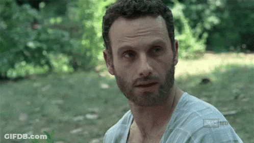 A Man With A Beard Is Wearing A Shirt That Says ' A.m.c. Hd ' On It . GIF
