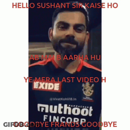 A Man With A Beard Is Wearing A Shirt That Says Exide On It GIF