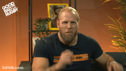 A Man With A Beard Is Wearing A Shirt That Says Gbr On It GIF