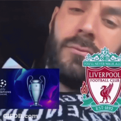 A Man With A Beard Is Wearing A Shirt That Says Liverpool Football Club GIF