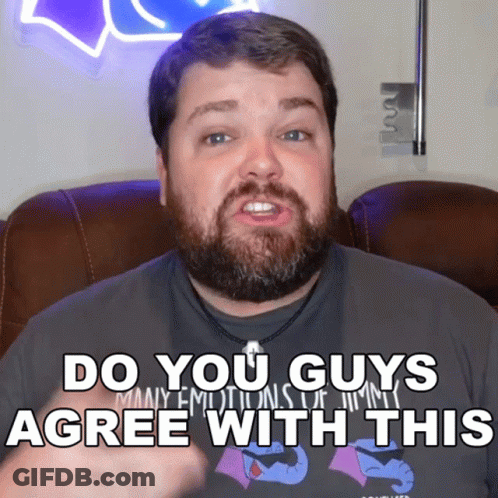 A Man With A Beard Is Wearing A Shirt That Says Many Emotions GIF