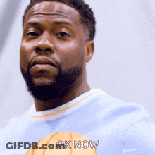 A Man With A Beard Is Wearing A Shirt That Says Ok Now On It GIF
