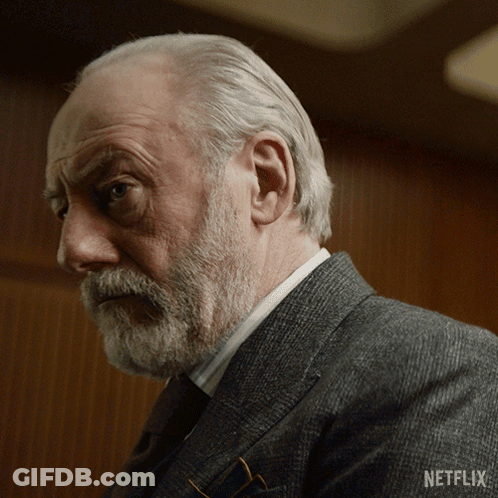 Man With Beard In Suit And Netflix Logo GIF