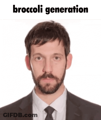 A Man With A Beard Is Wearing A Suit And Tie With The Words Broccoli Generation Written Above Him GIF