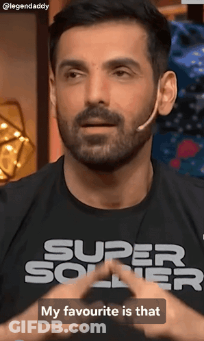 A Man With A Beard Is Wearing A Super Soldier T-Shirt GIF