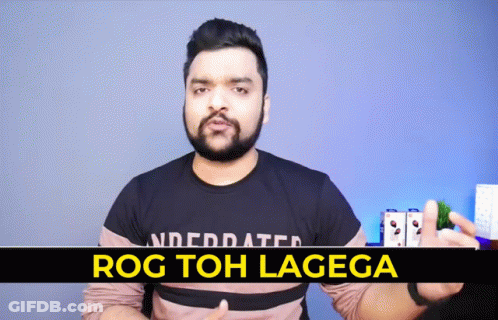 A Man With A Beard Is Wearing A T-Shirt That Says " Rog Toh Lagega " GIF