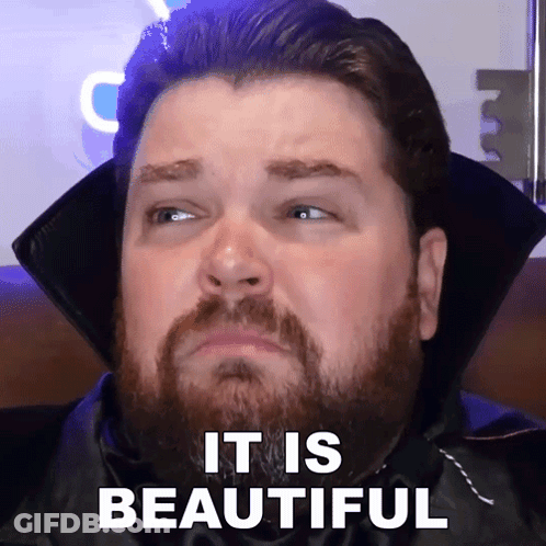 A Man With A Beard Is Wearing A Vampire Costume And Says " It Is Beautiful " GIF
