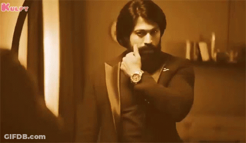 A Man With A Beard Is Wearing A Watch And Has The Word Kulfy Written On The Bottom Right GIF