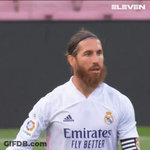 A Man With A Beard Is Wearing A White Emirates Fly Better Jersey GIF