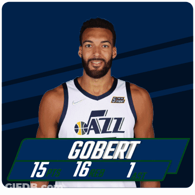 A Man With A Beard Is Wearing A White Jazz Jersey GIF