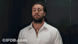 Bearded Man In White Shirt And Necklace GIF