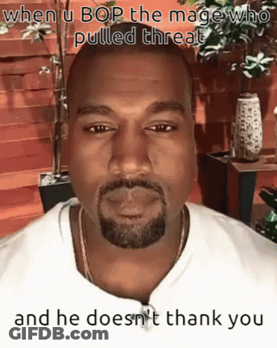 A Man With A Beard Is Wearing A White Shirt And A Necklace . GIF