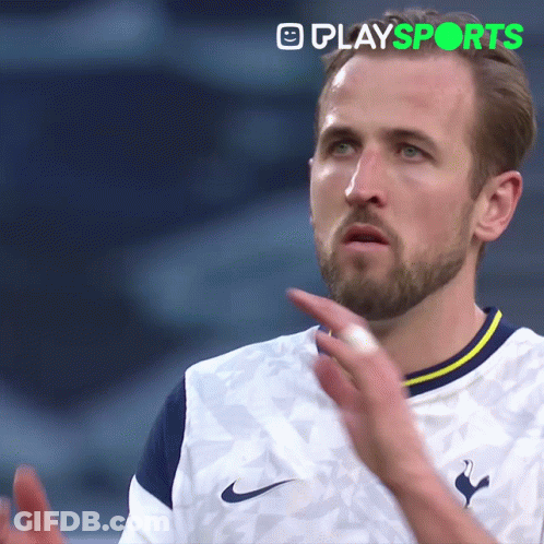A Man With A Beard Is Wearing A White Shirt That Says Nike On It GIF