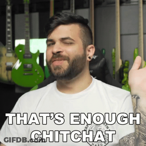 A Man With A Beard Is Wearing A White Shirt That Says That 'S Enough Chitchat On It GIF