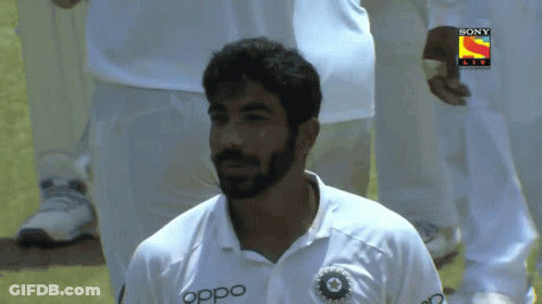 A Man With A Beard Is Wearing A White Shirt With The Word Oppo On It GIF