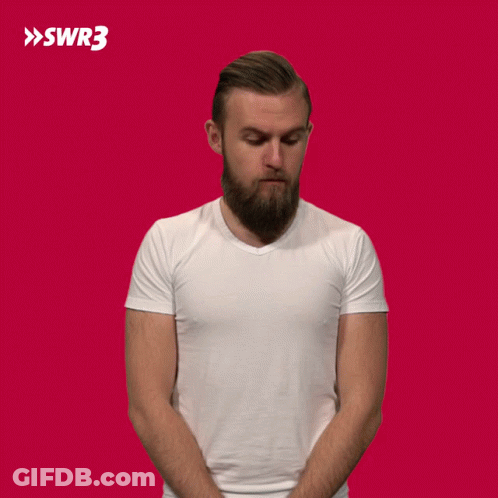 A Man With A Beard Is Wearing A White T-Shirt With Swr3 In White Letters GIF