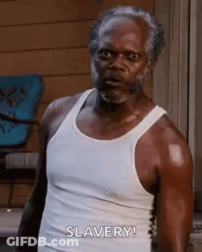 A Man With A Beard Is Wearing A White Tank Top And Making A Face . GIF
