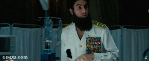Man In U.S. Navy Uniform Sitting At Desk GIF