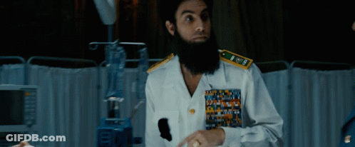 Bearded Man In Navy Uniform With US Navy Badge GIF