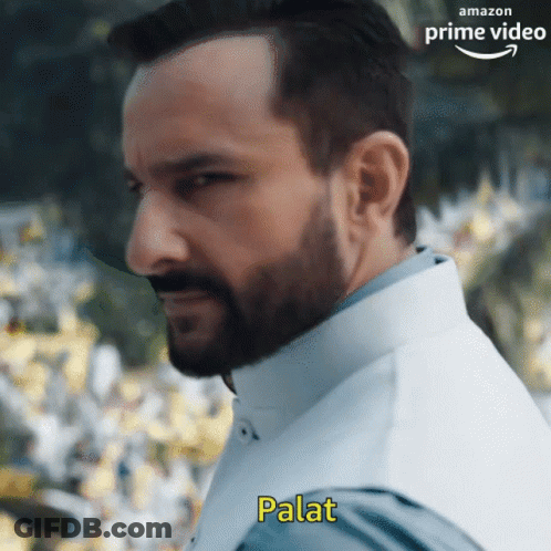 A Man With A Beard Is Wearing A White Vest And Has The Word Palat Written On His Chest GIF
