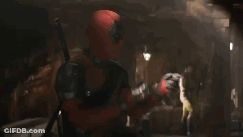 A Man With A Beard Is Wearing A Yellow And Blue Jacket And Saying Let 'S Fucking Go . GIF
