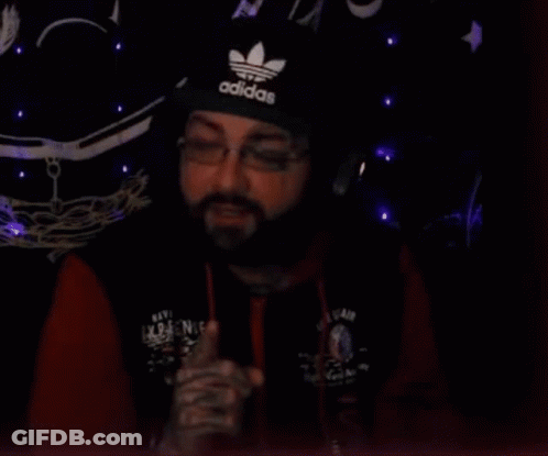 A Man With A Beard Is Wearing An Adidas Hat And Glasses And Says I 'M Glad You Said That . GIF