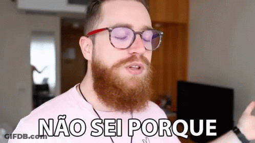 A Man With A Beard Is Wearing Glasses And Says Não Sei Porque GIF