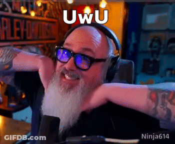 A Man With A Beard Is Wearing Headphones And Glasses And Has The Word Uwu On His Face GIF