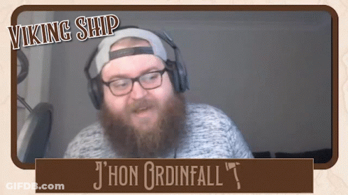 A Man With A Beard Is Wearing Headphones And Has The Name Jhon Ordainfall On The Bottom GIF