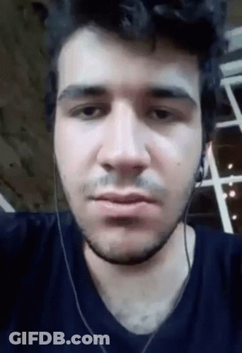 Man With Beard Making Funny Face Wearing Headphones GIF