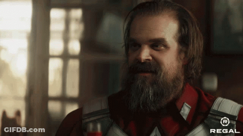 Man With Beard Wearing Overalls And Red Regal Shirt GIF