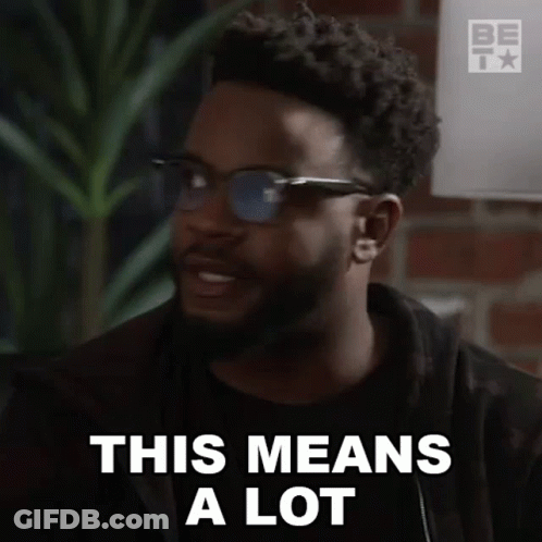 A Man With A Beard Is Wearing Sunglasses And Says This Means A Lot . GIF