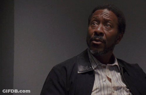A Man With A Beard Looks Up At The Words No One Cares GIF