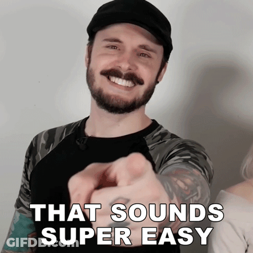 A Man With A Beard Pointing At The Camera With The Words That Sounds Super Easy Behind Him GIF