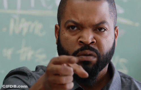 A Man With A Beard Points At The Camera GIF