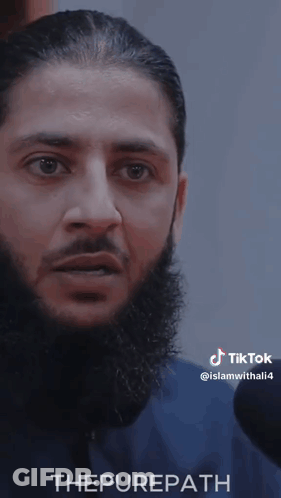 A Man With A Beard Says " Do N't Take " GIF