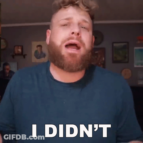 A Man With A Beard Says " I Didn 'T " GIF