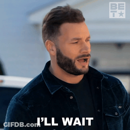 A Man With A Beard Says I 'Ll Wait In Front Of A Car GIF