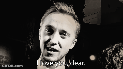 A Man With A Beard Says I Love You Dear In A Black And White Photo GIF