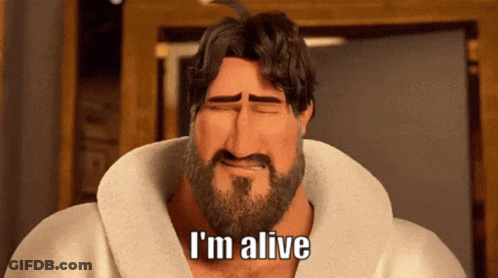 A Man With A Beard Says I 'M Alive With His Eyes Closed GIF