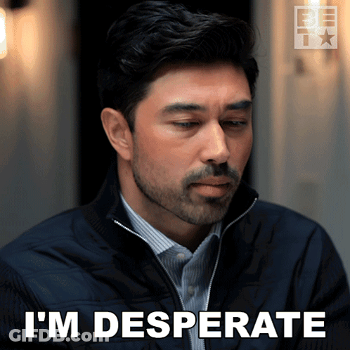 A Man With A Beard Says I 'M Desperate On His Face GIF