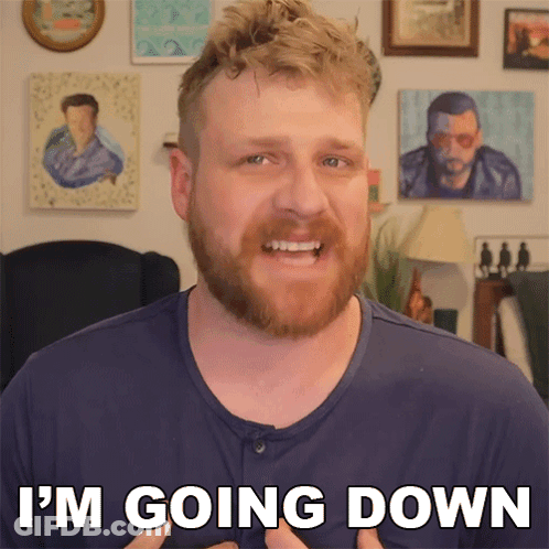 A Man With A Beard Says I 'M Going Down In Front Of Paintings On The Wall GIF