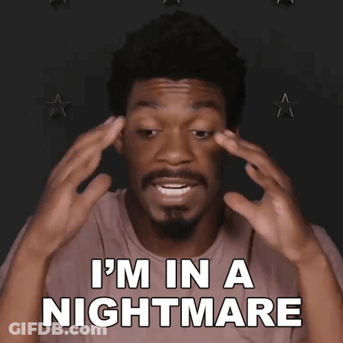 A Man With A Beard Says I 'M In A Nightmare With His Hands On His Head GIF