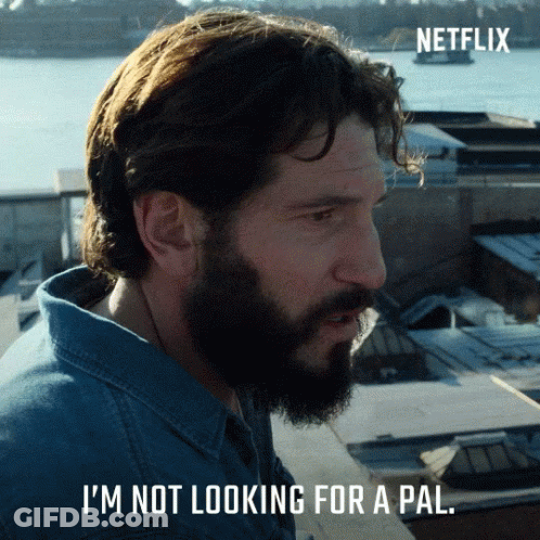 A Man With A Beard Says " I 'M Not Looking For A Pal " In A Netflix Ad GIF
